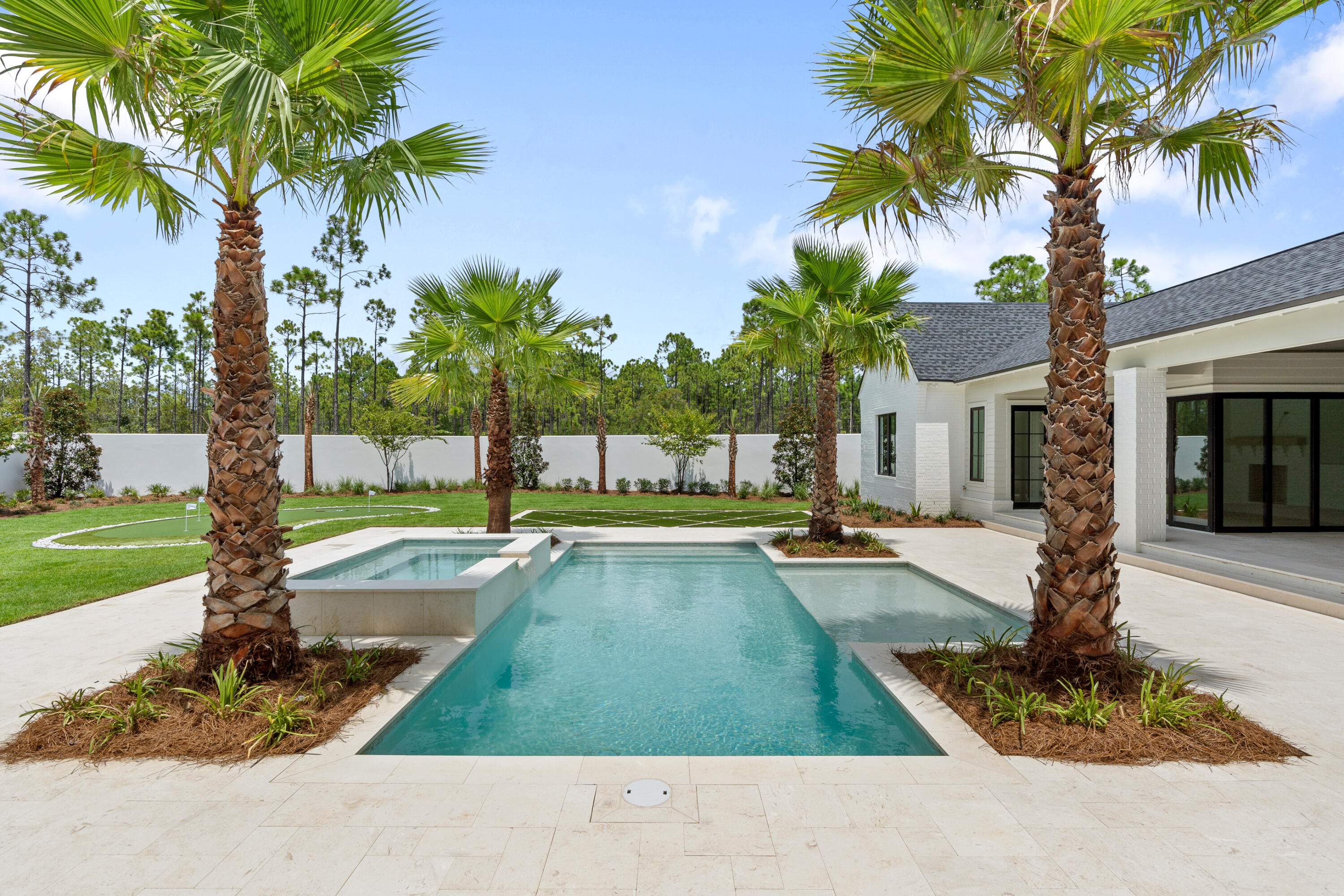 181 Quail Hollow Inlet Beach, FL 32461 - Photo 9 of 47 a view of a house with a swimming pool and sitting area