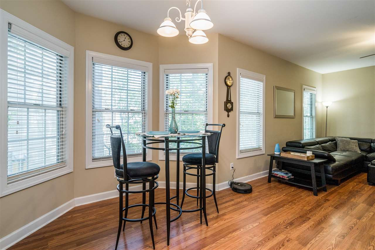 7016 Sandy Forks Road, Unit 201 Raleigh, NC 27609 - Photo 11 of 28 Dining area sits in between kitchen and living room for a spacious open concept! Dining Area