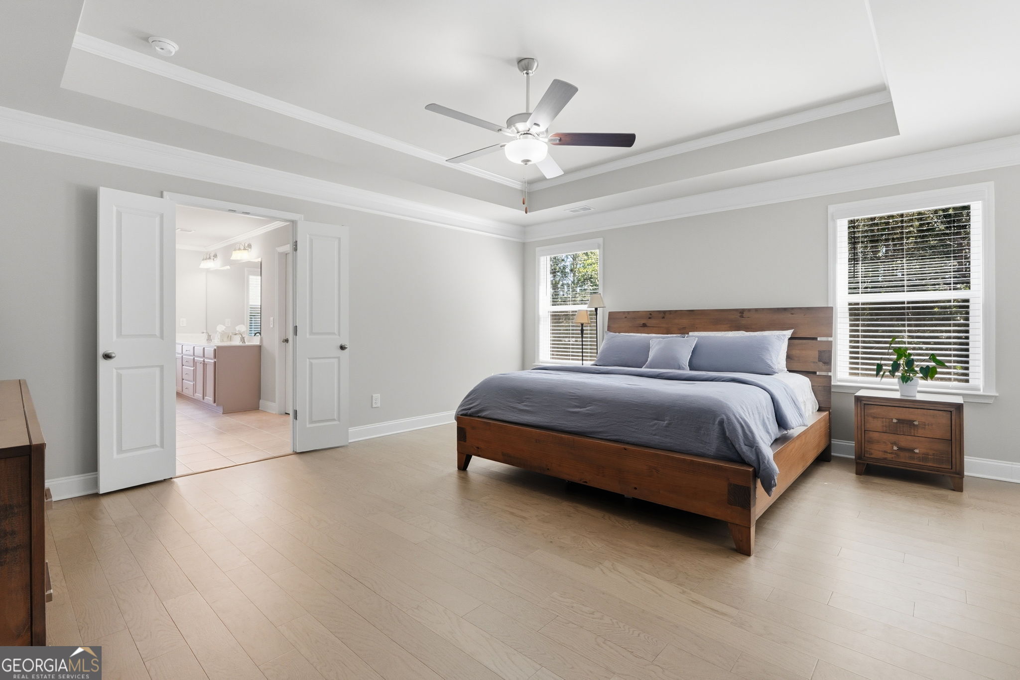604 O'Brians Path McDonough, GA 30253 - Photo 20 of 41 a bedroom with a bed and window