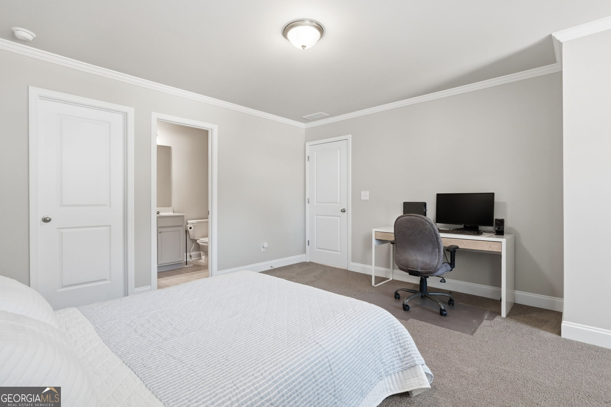 604 O'Brians Path McDonough, GA 30253 - Photo 27 of 41 a bedroom with a workspace