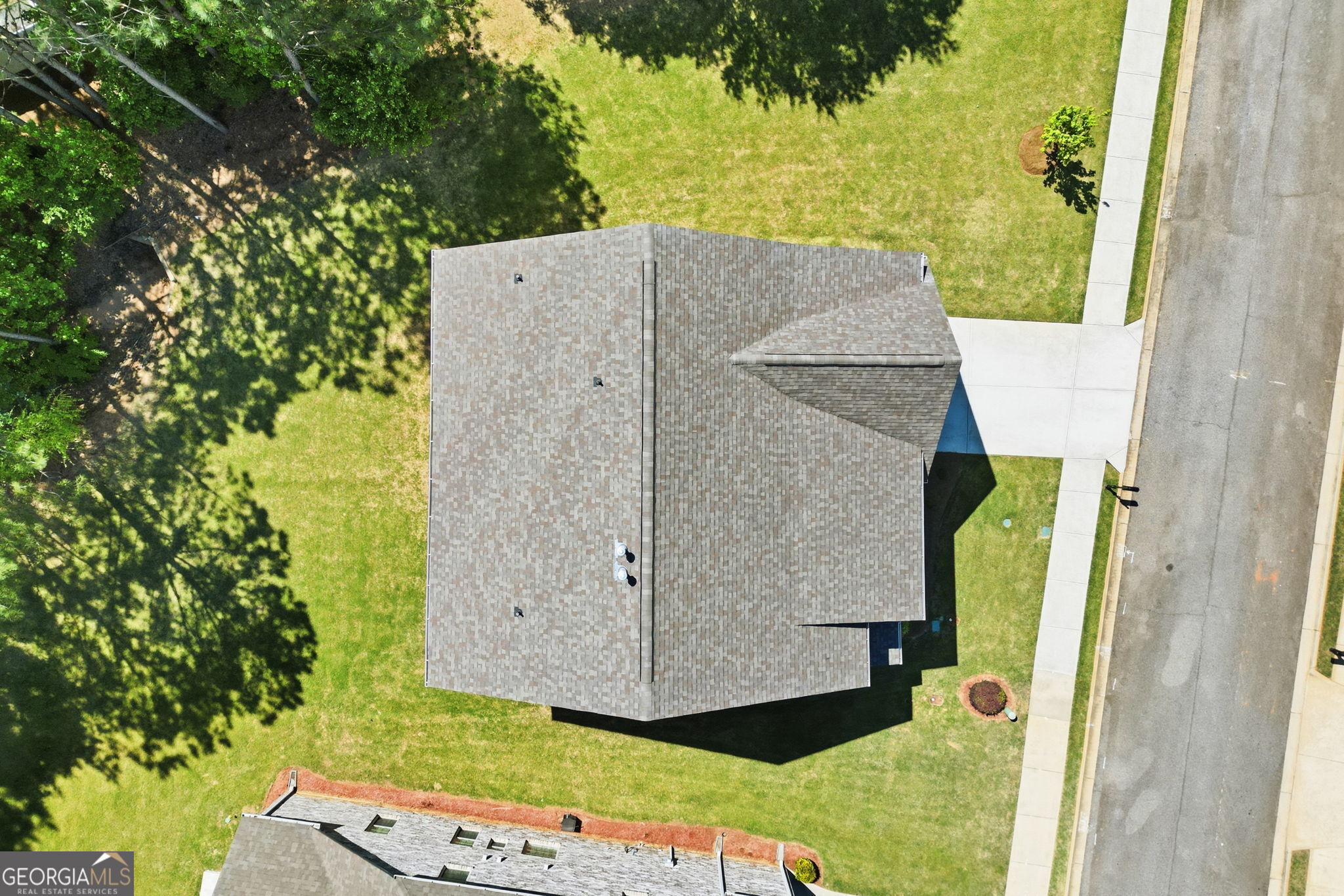 604 O'Brians Path McDonough, GA 30253 - Photo 33 of 41 an aerial view of a house with a backyard space