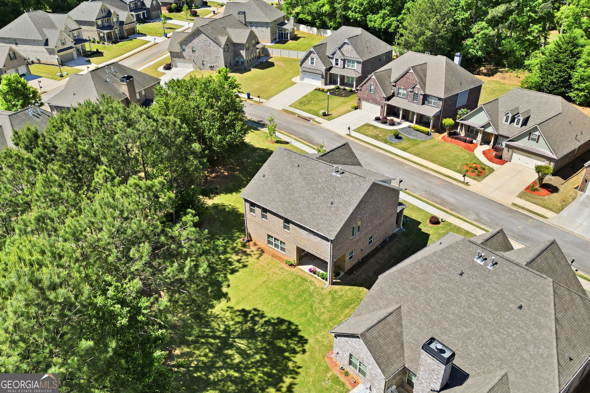 604 O'Brians Path McDonough, GA 30253 - Photo 34 of 41 an aerial view of a house with a garden