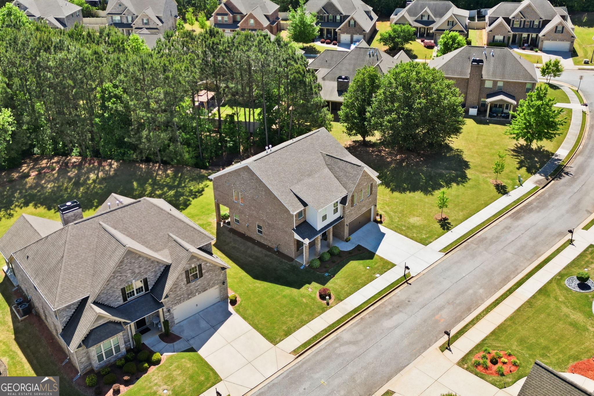 604 O'Brians Path McDonough, GA 30253 - Photo 36 of 41 an aerial view of a house with a garden