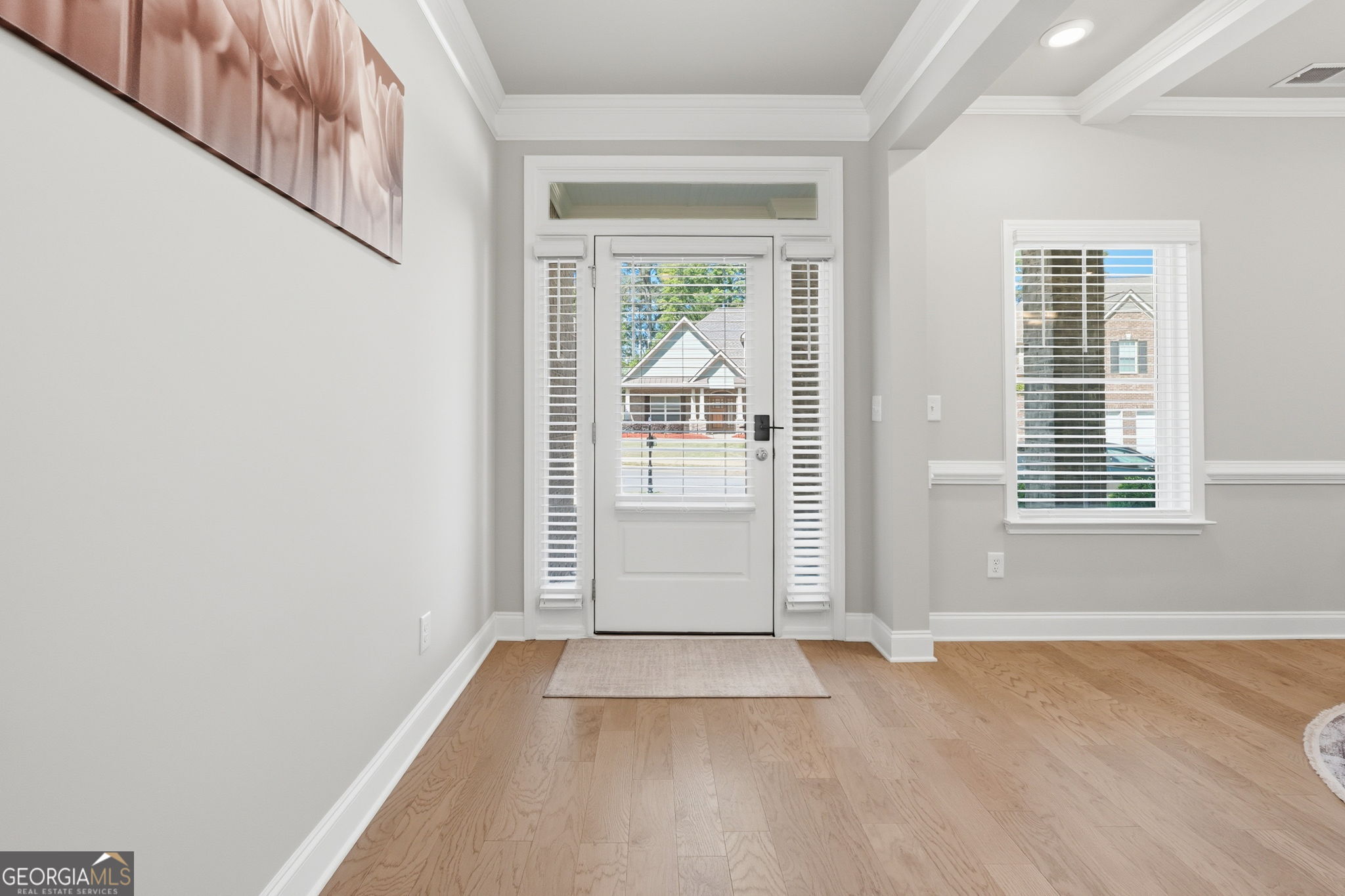 604 O'Brians Path McDonough, GA 30253 - Photo 4 of 41 an empty room with windows