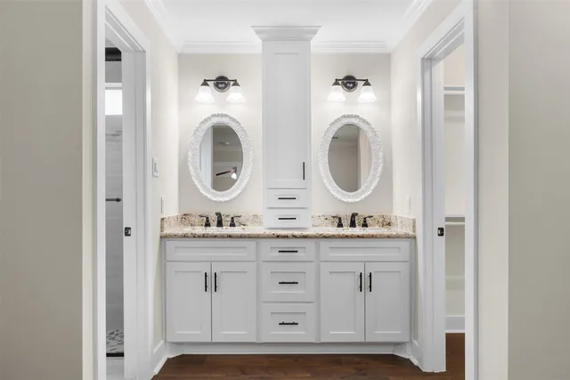 an empty room with wooden floor and window