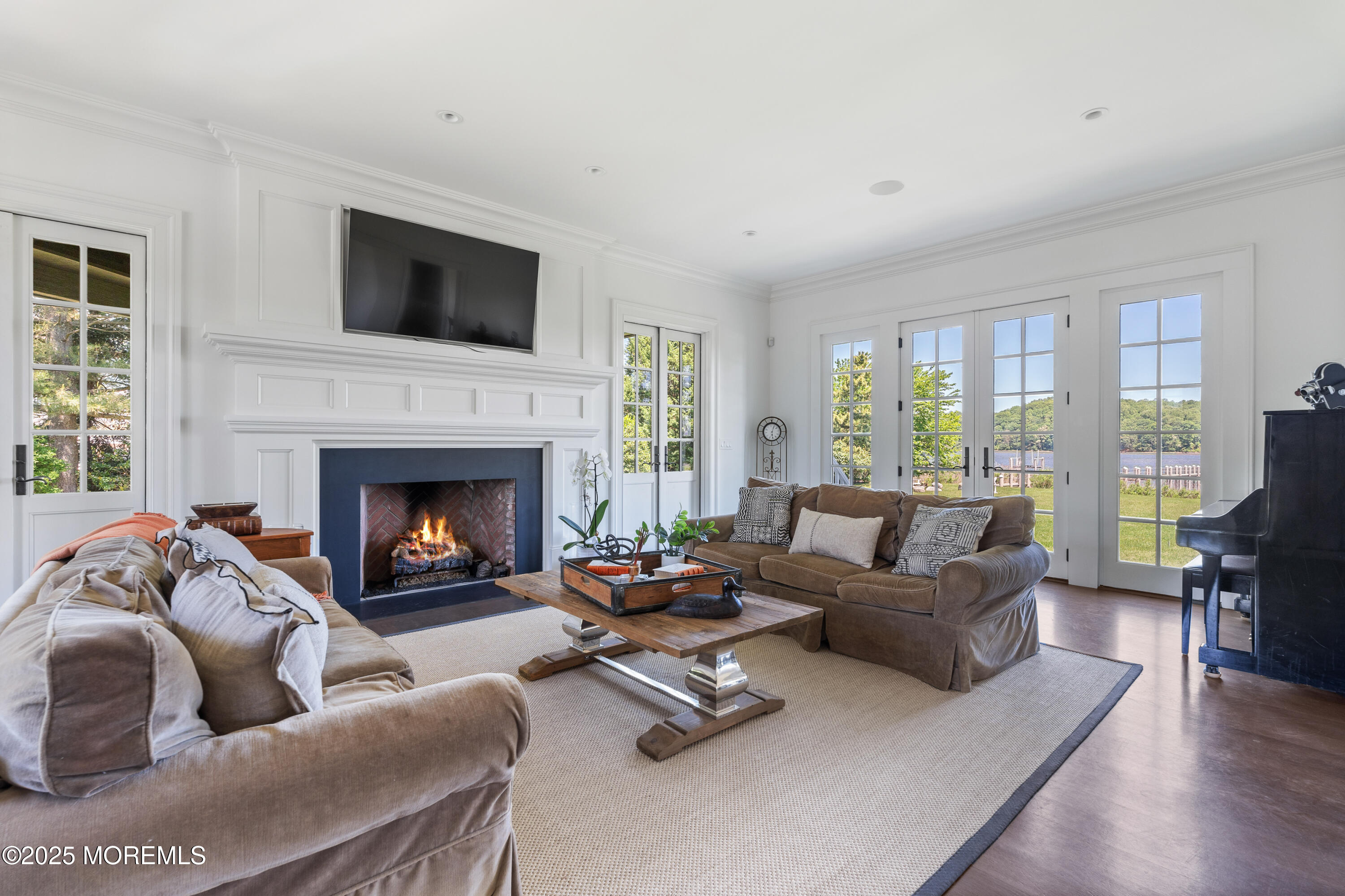 0 Wilson Circle Rumson, NJ 07760 - Photo 11 of 74 a living room with furniture fireplace and a large window