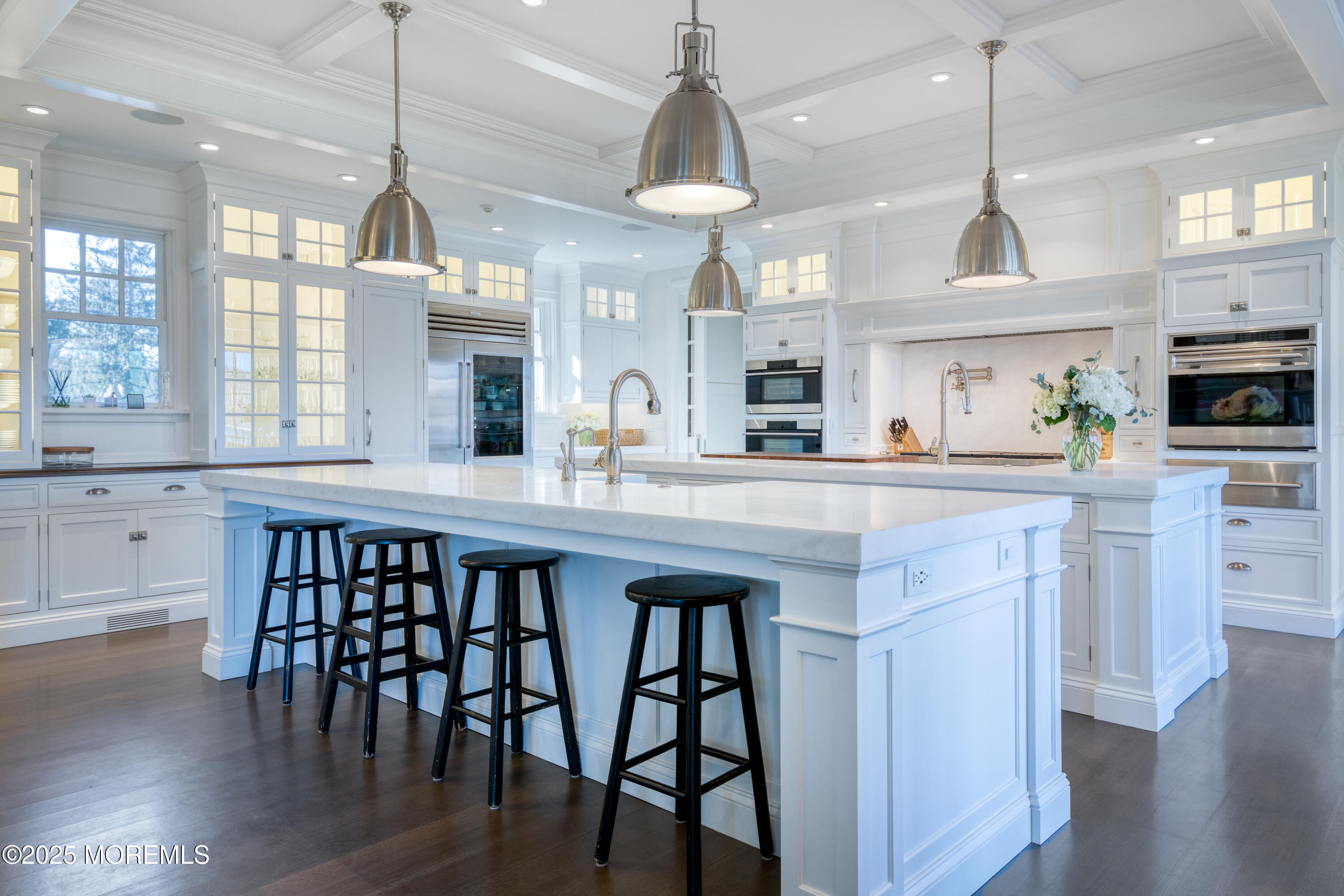 0 Wilson Circle Rumson, NJ 07760 - Photo 14 of 74 a kitchen with a dining table chairs sink and wooden floor
