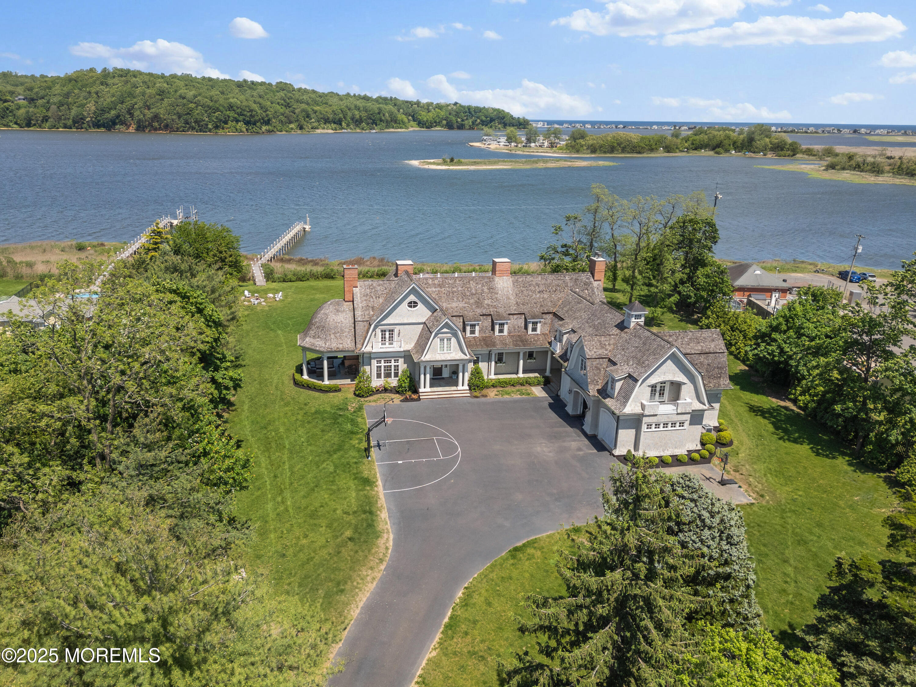 0 Wilson Circle Rumson, NJ 07760 - Photo 2 of 74 an aerial view of a house with outdoor space and lake view