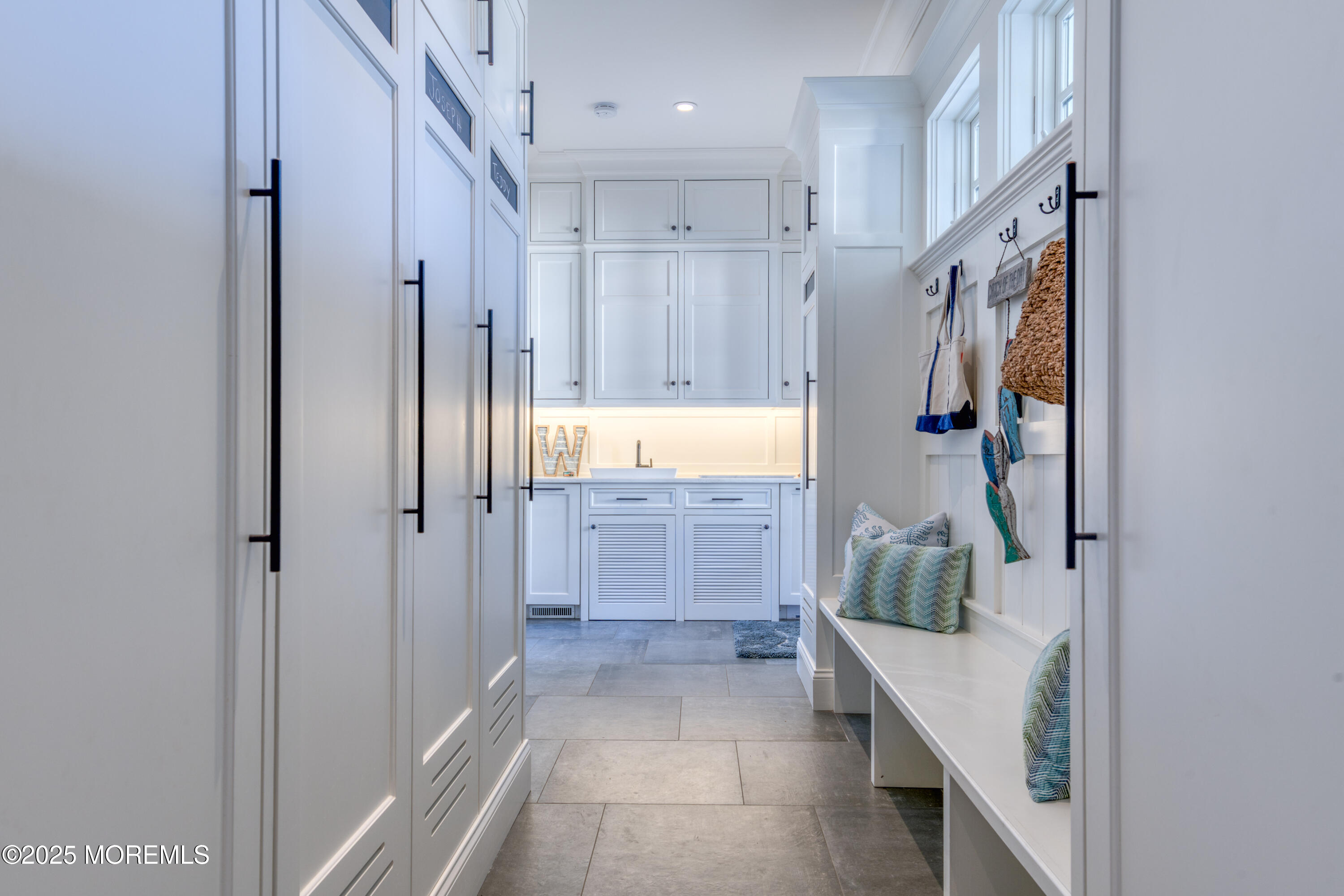 0 Wilson Circle Rumson, NJ 07760 - Photo 27 of 74 a bathroom with a tub shower and sink