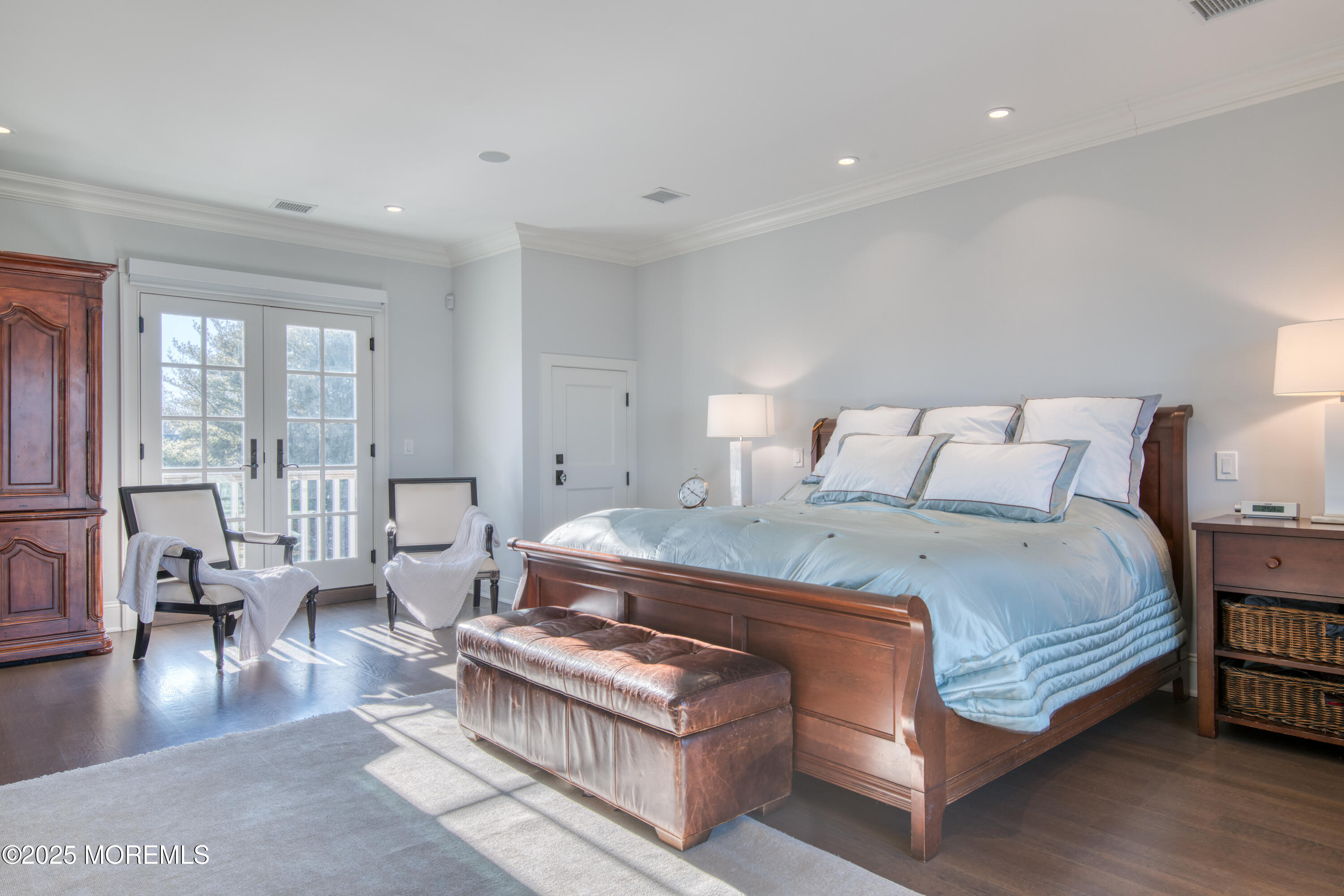 0 Wilson Circle Rumson, NJ 07760 - Photo 32 of 74 a bedroom with a bed couch and a large window