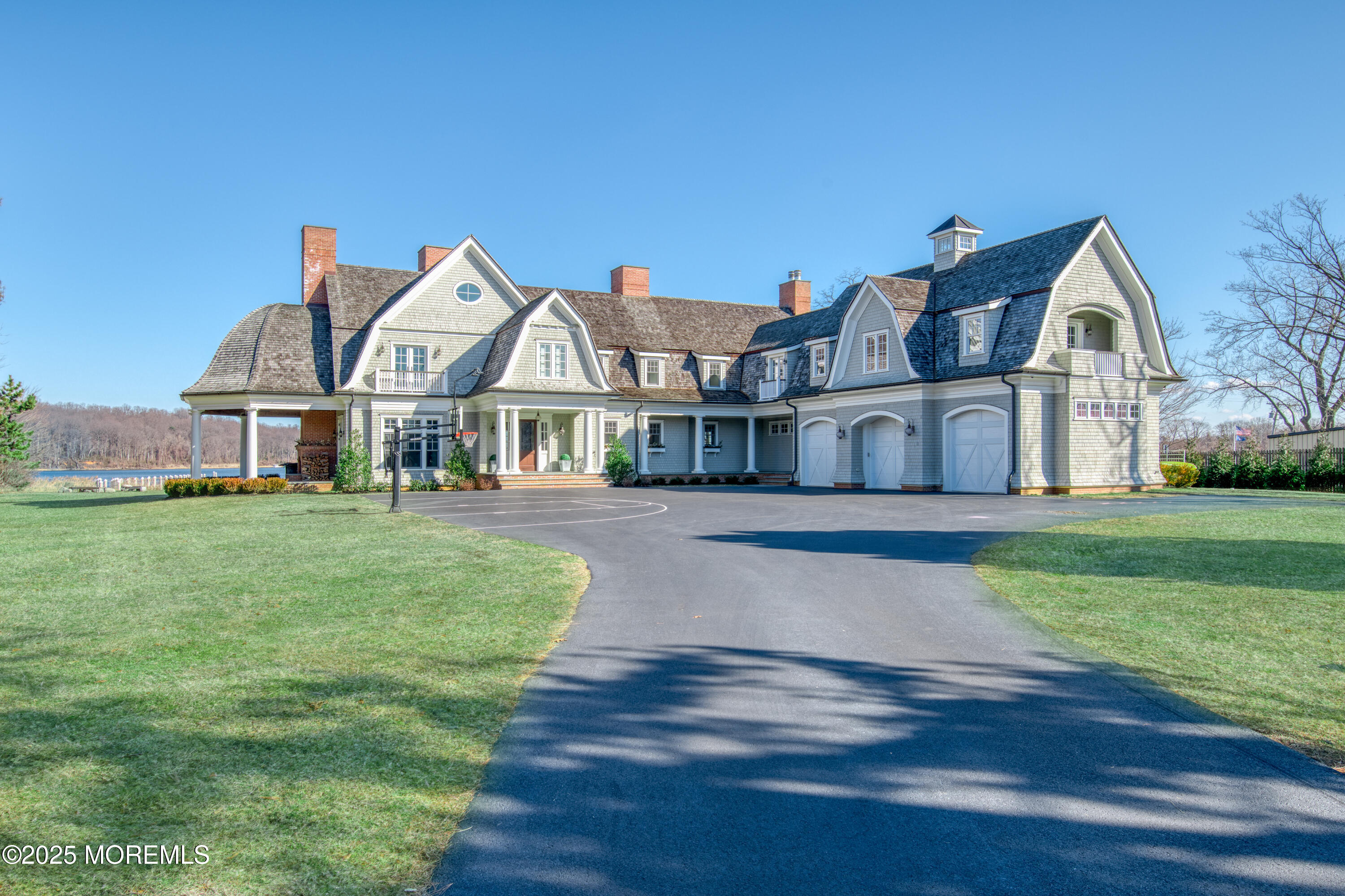 0 Wilson Circle Rumson, NJ 07760 - Photo 4 of 74 a front view of a house with a yard