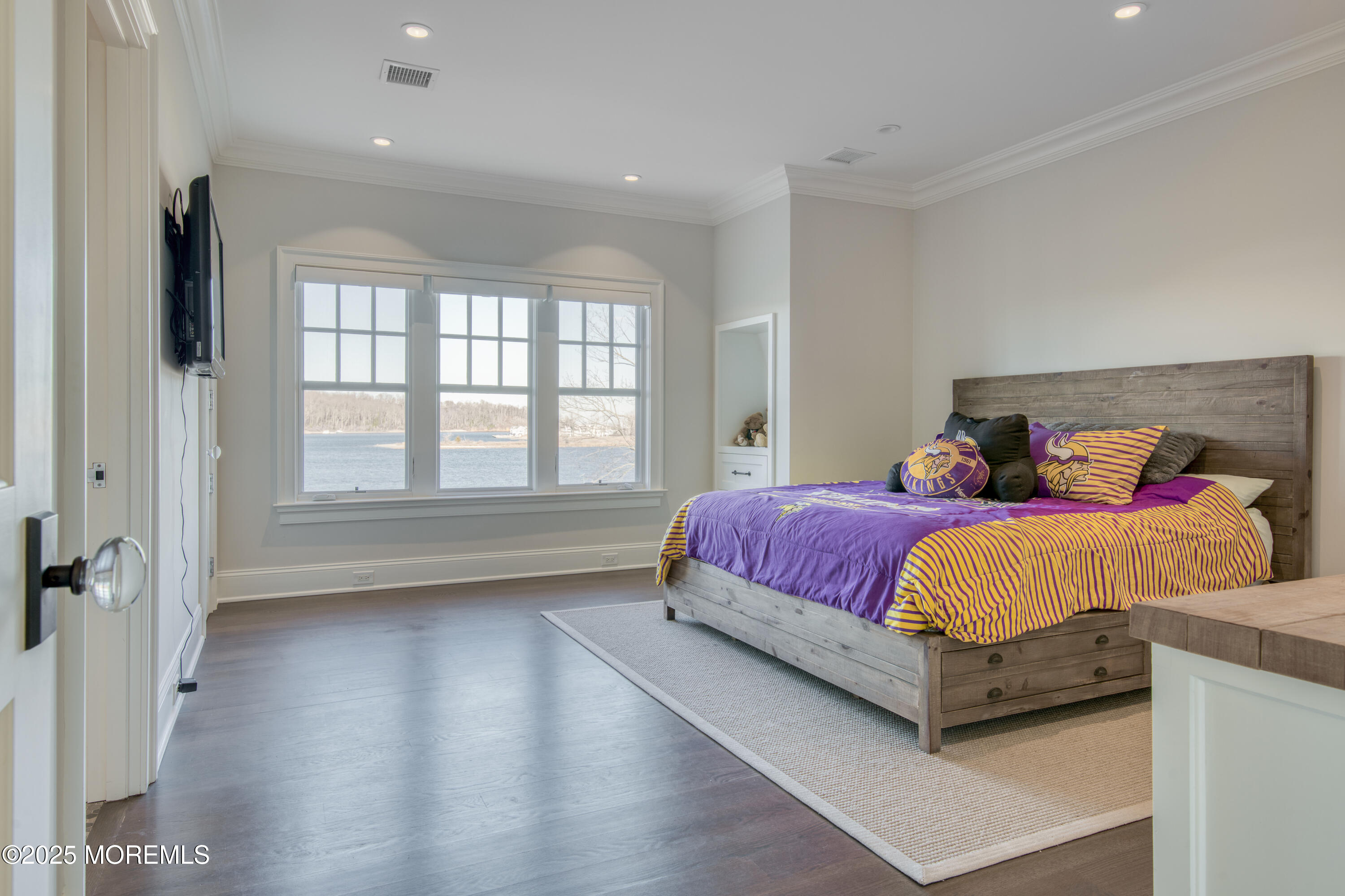 0 Wilson Circle Rumson, NJ 07760 - Photo 41 of 74 a spacious bedroom with a bed and a window