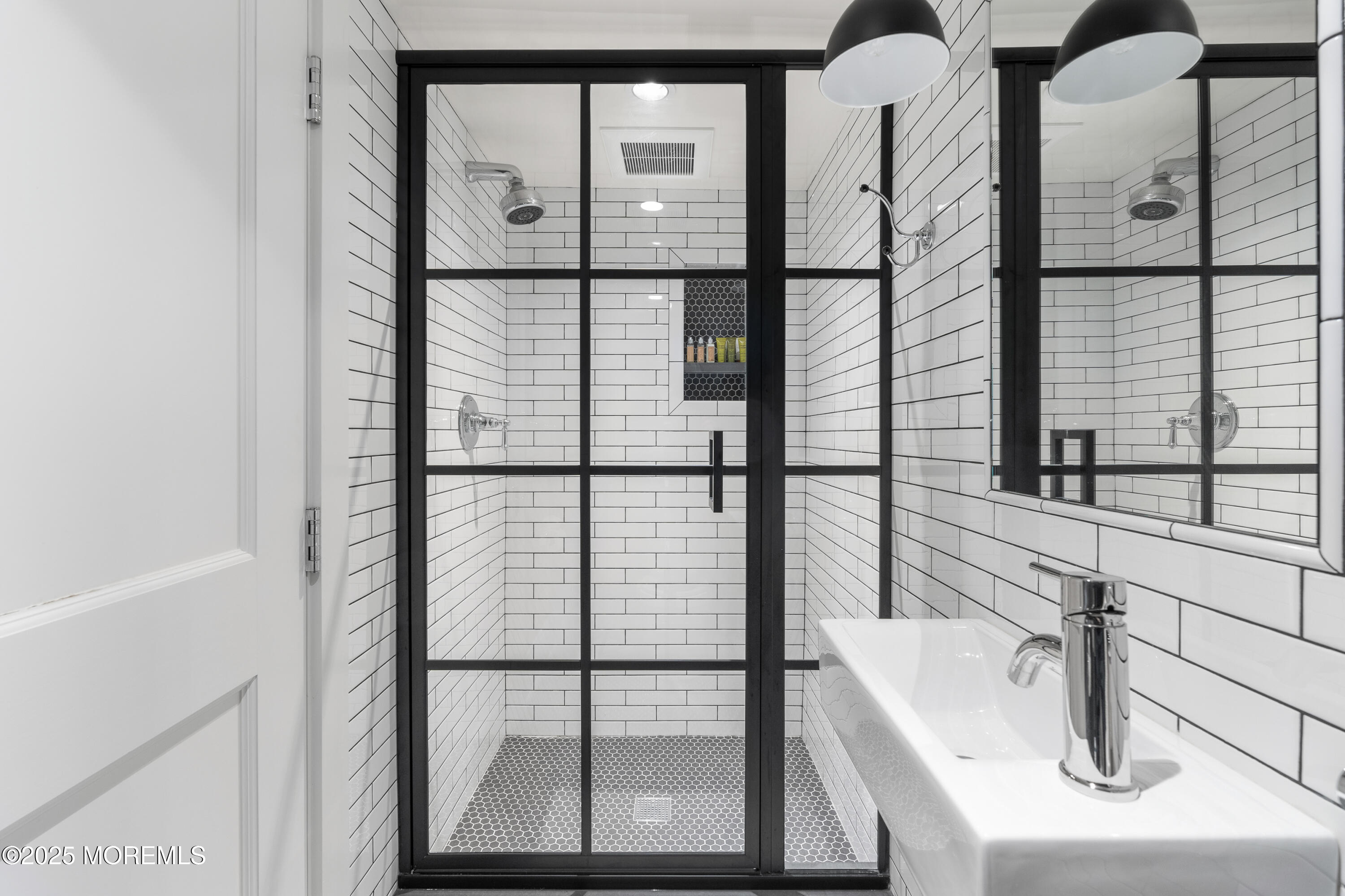 0 Wilson Circle Rumson, NJ 07760 - Photo 49 of 74 a bathroom with a sink and a large mirror