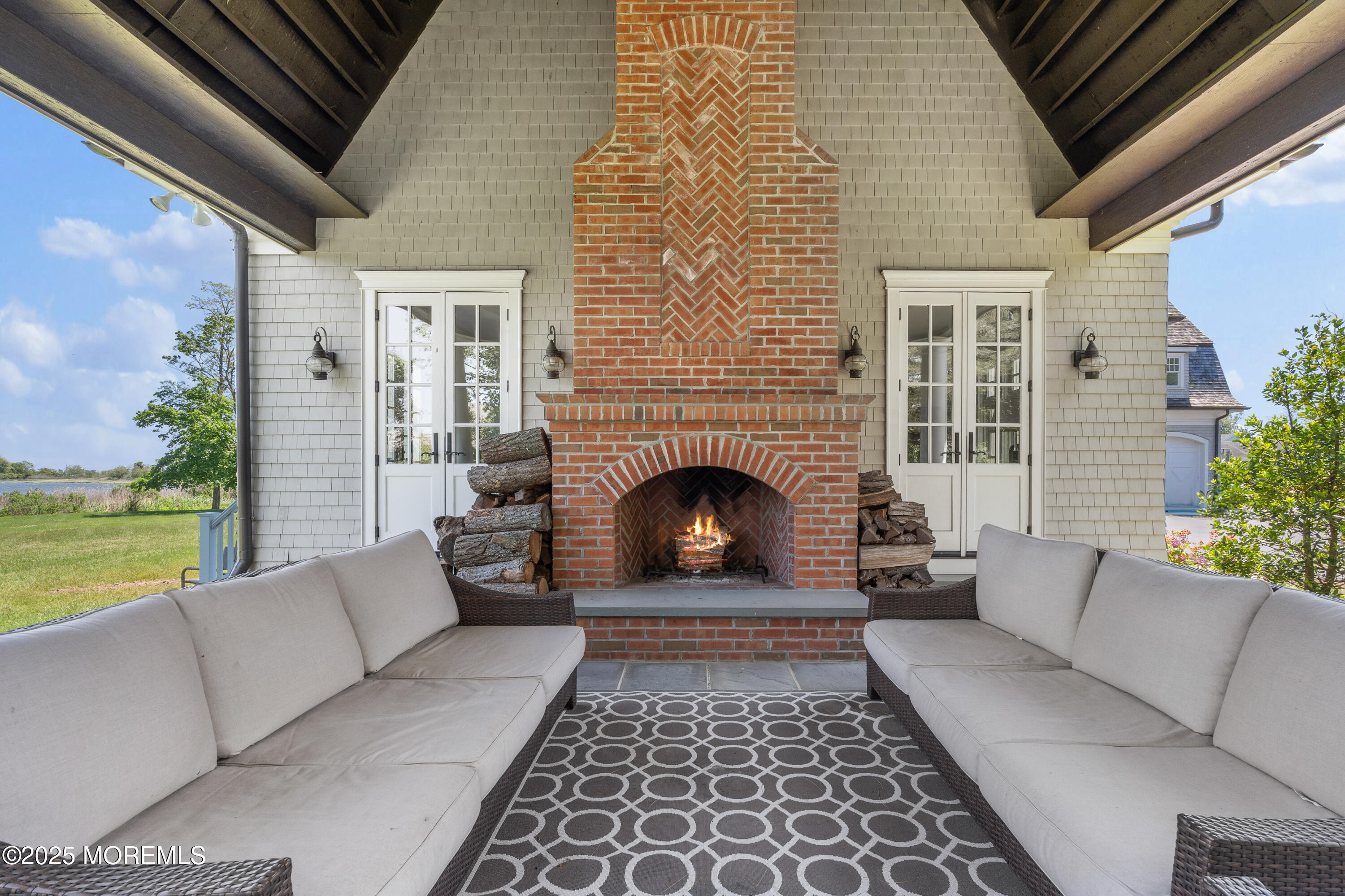 0 Wilson Circle Rumson, NJ 07760 - Photo 57 of 74 a living room with furniture and a fireplace