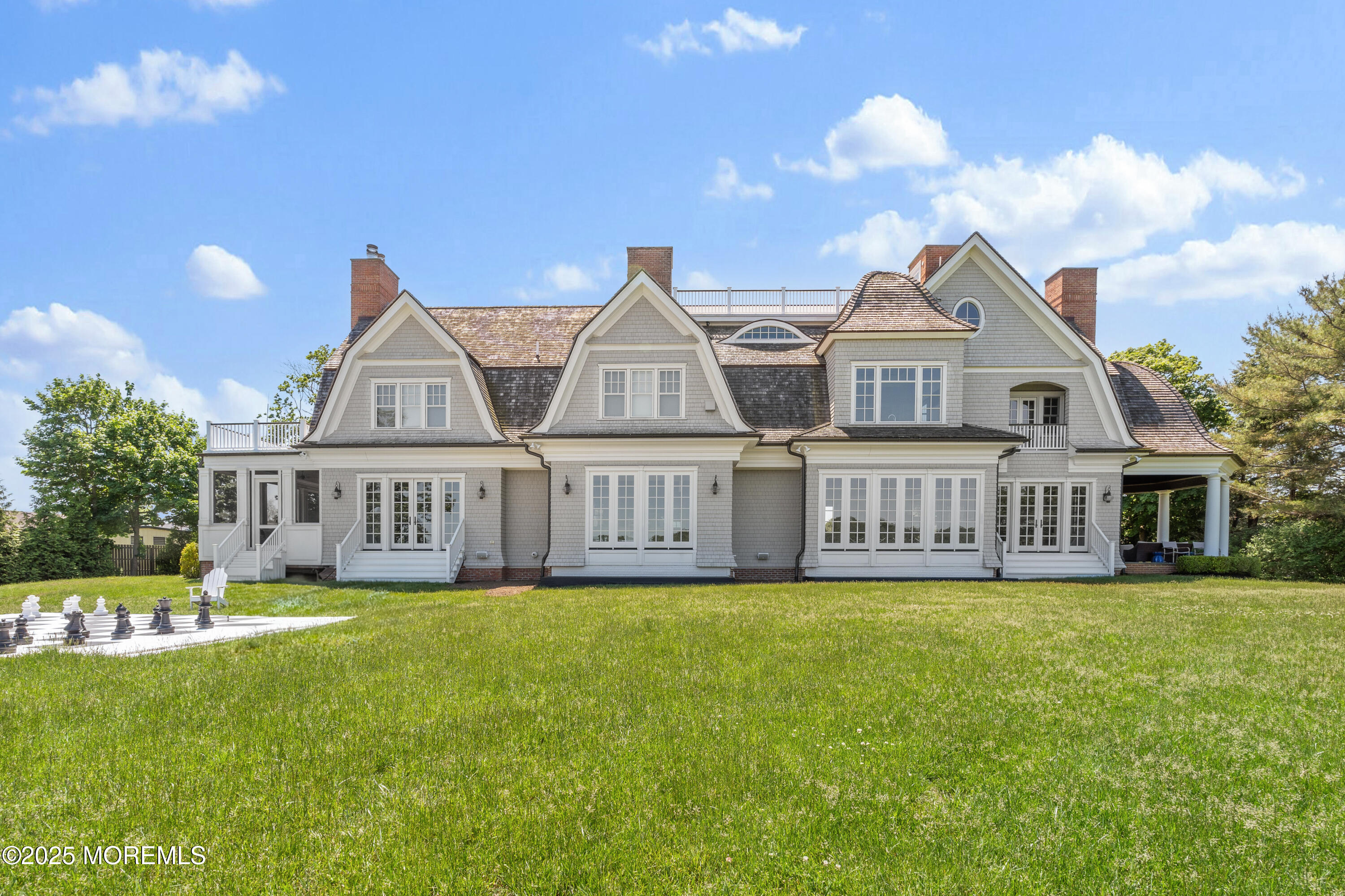 0 Wilson Circle Rumson, NJ 07760 - Photo 60 of 74 a view of a house with a yard and sitting area