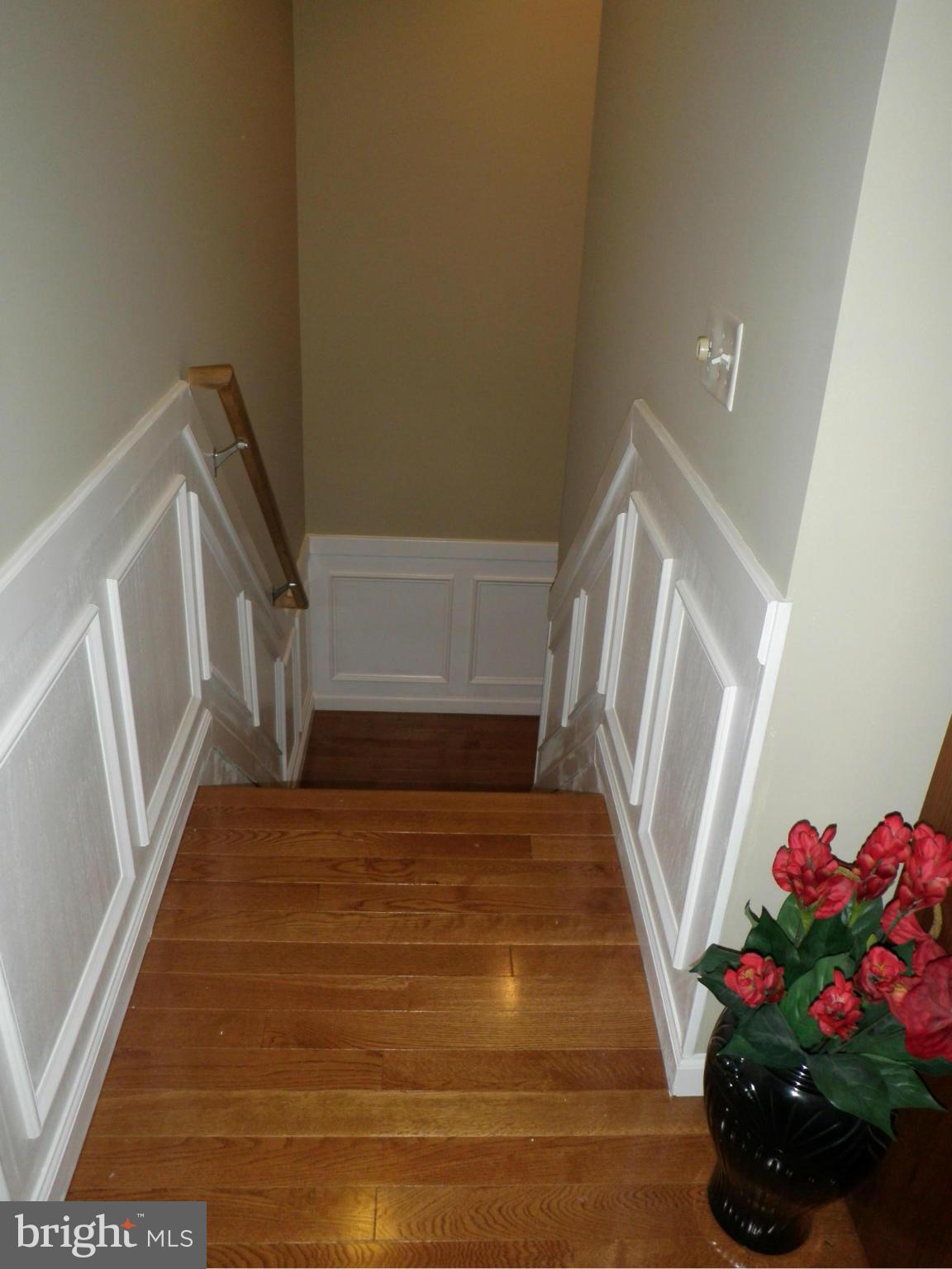 236 Twin Beach Road Pasadena, MD 21122 - Photo 20 of 30 Wainscot in the stair caseView