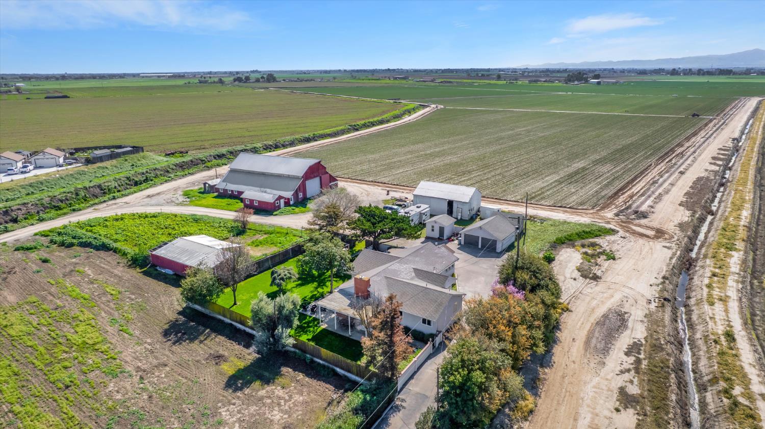 6450 Delta Avenue Tracy, CA 95304 - Photo 1 of 49 an aerial view of a house with a lake view