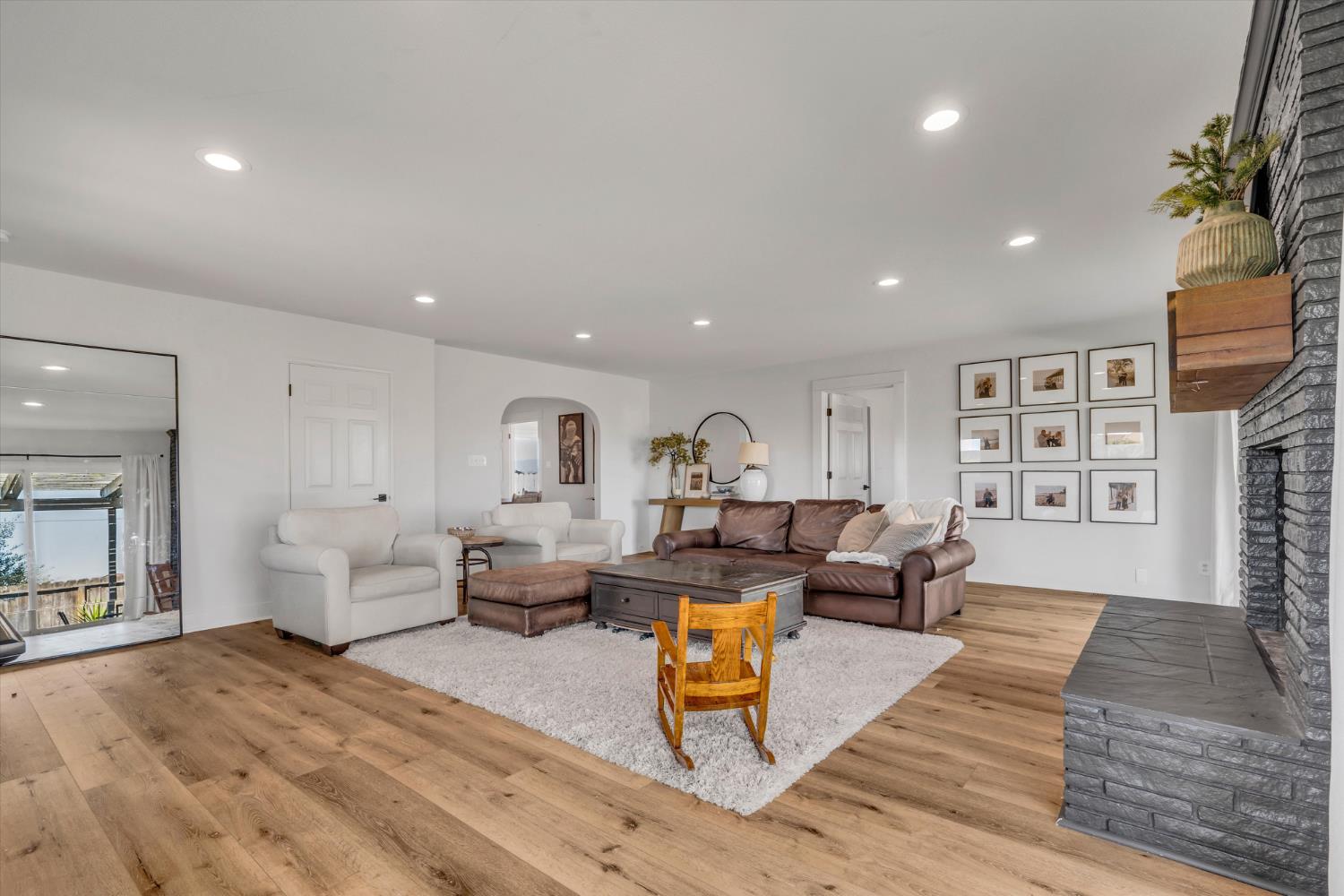 6450 Delta Avenue Tracy, CA 95304 - Photo 11 of 49 a living room with furniture and a wooden floor