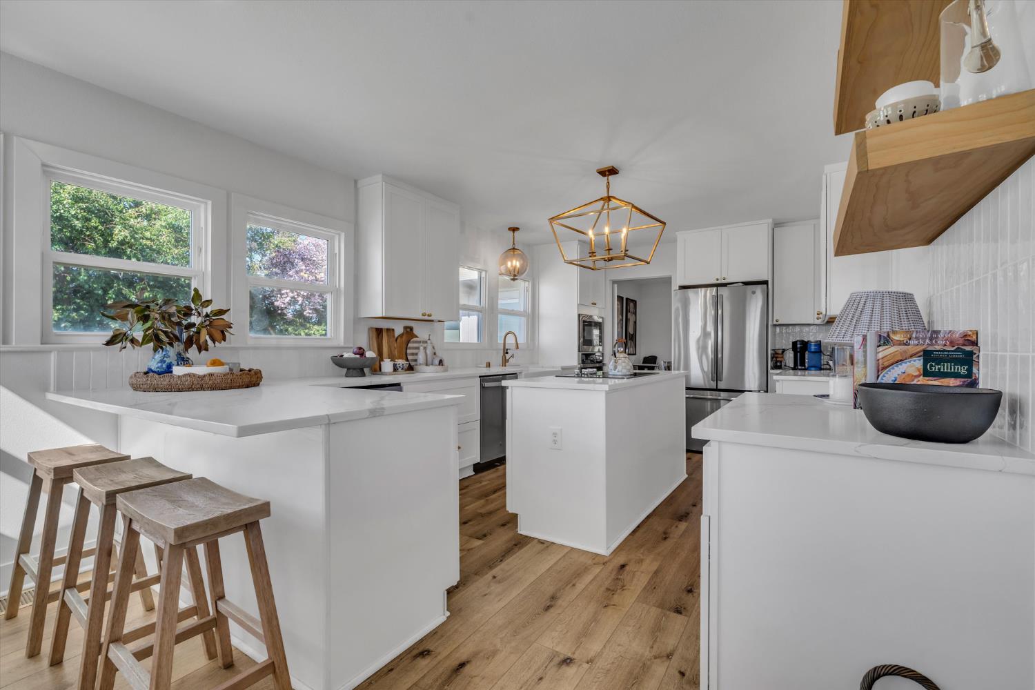 6450 Delta Avenue Tracy, CA 95304 - Photo 14 of 49 a kitchen with sink and refrigerator