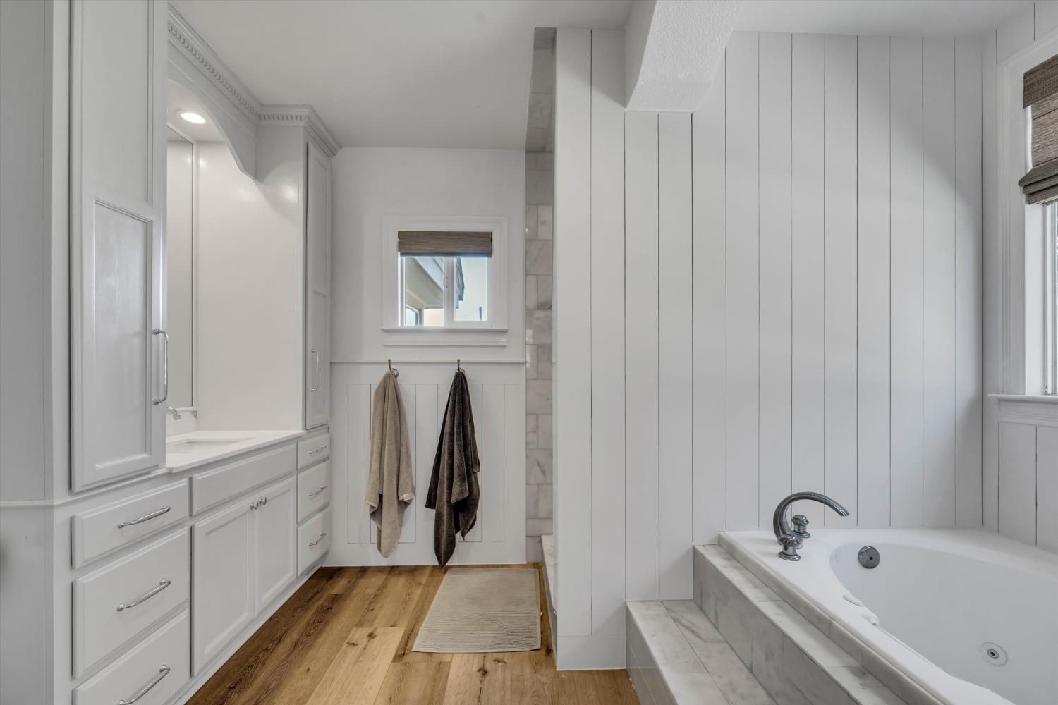 6450 Delta Avenue Tracy, CA 95304 - Photo 23 of 49 a bathroom with a bathtub and a sink
