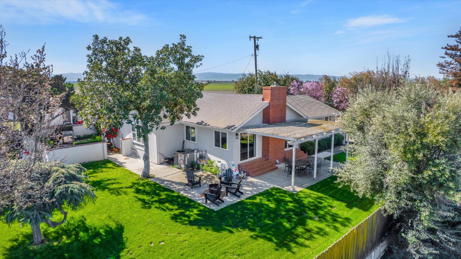 6450 Delta Avenue Tracy, CA 95304 - Photo 4 of 49 a front view of a house with garden