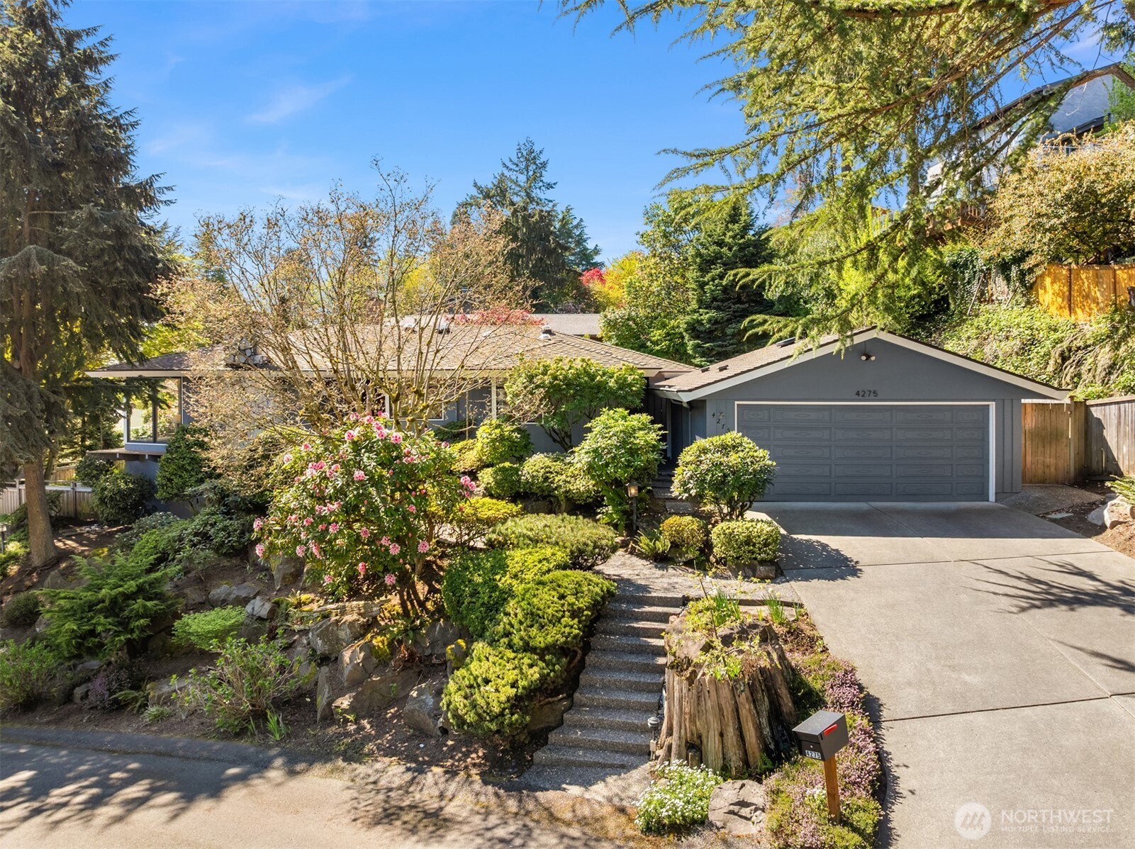 4275 95th Avenue Southeast Mercer Island, WA 98040 - Photo 1 of 40 a view of a back yard of the house