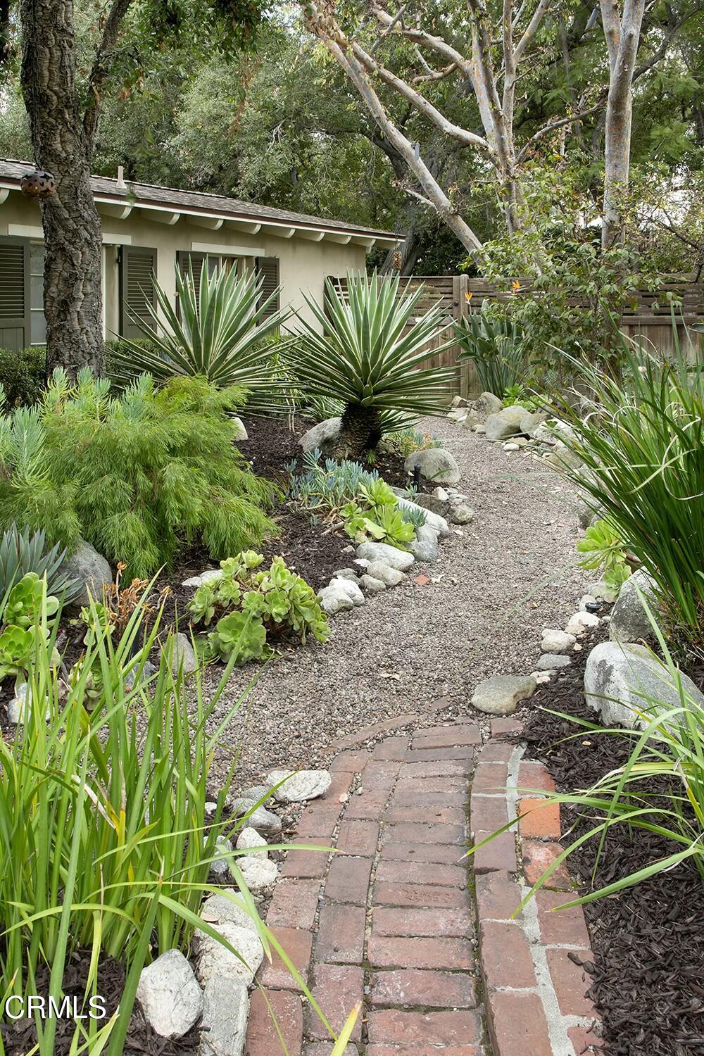 1126 Wotkyns Drive Pasadena, CA 91103 - Photo 24 of 31 a front view of a house with a yard