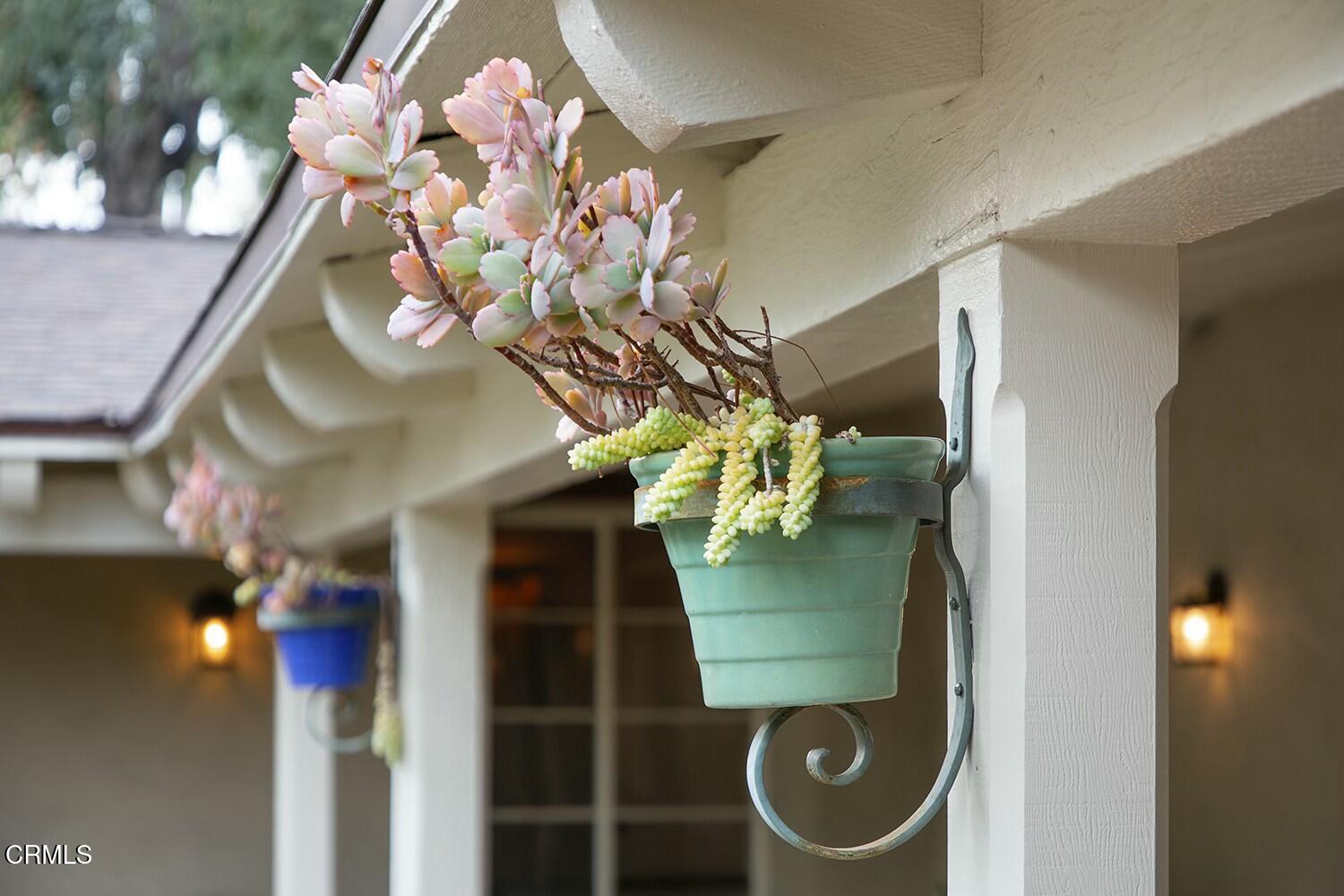 1126 Wotkyns Drive Pasadena, CA 91103 - Photo 28 of 31 a bathroom with a sink and mirror