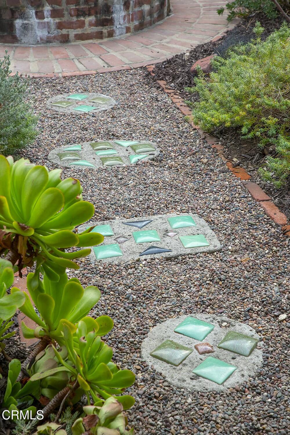 1126 Wotkyns Drive Pasadena, CA 91103 - Photo 31 of 31 a view of a backyard with plants and a patio