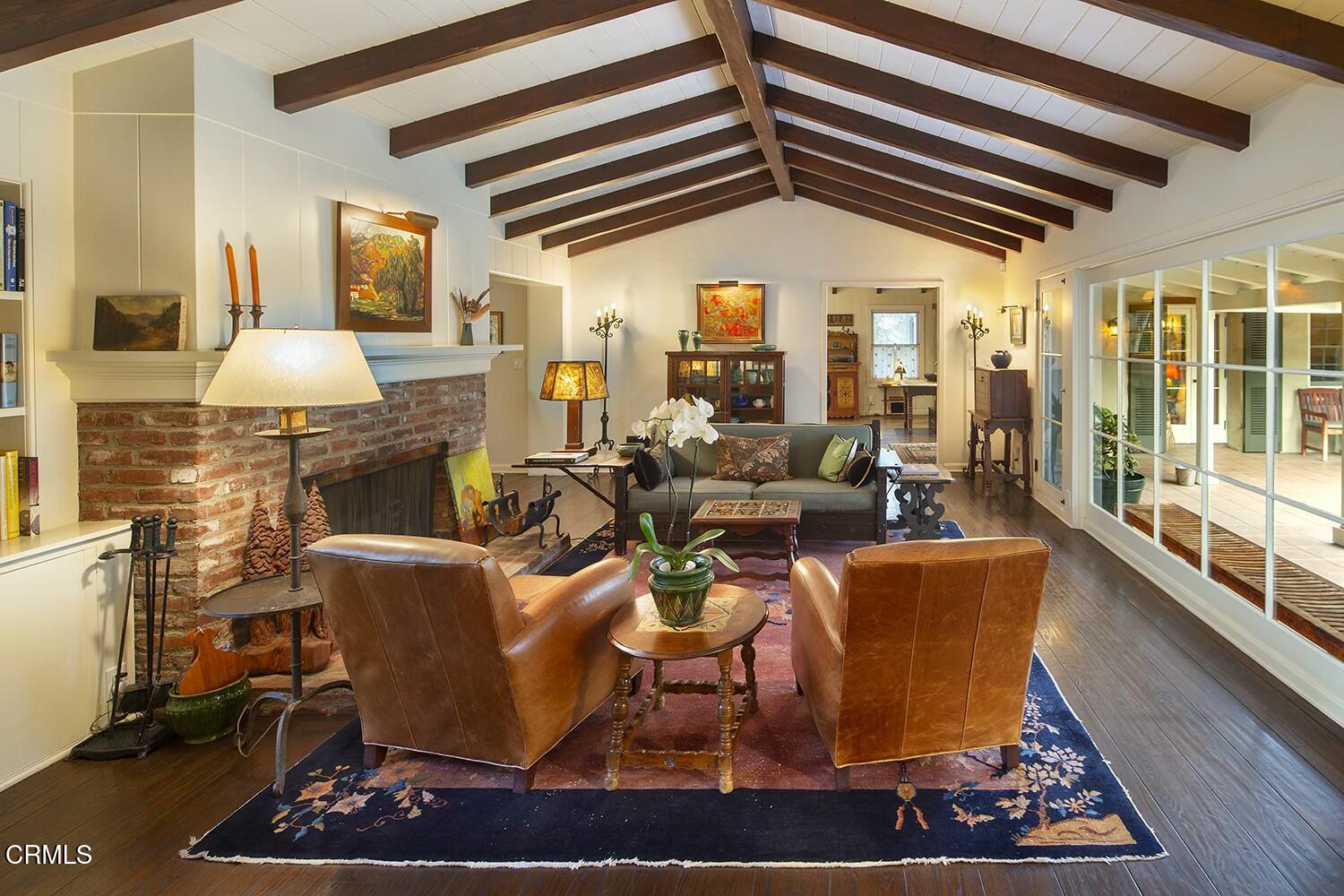 1126 Wotkyns Drive Pasadena, CA 91103 - Photo 5 of 31 a living room with fireplace furniture and a large window
