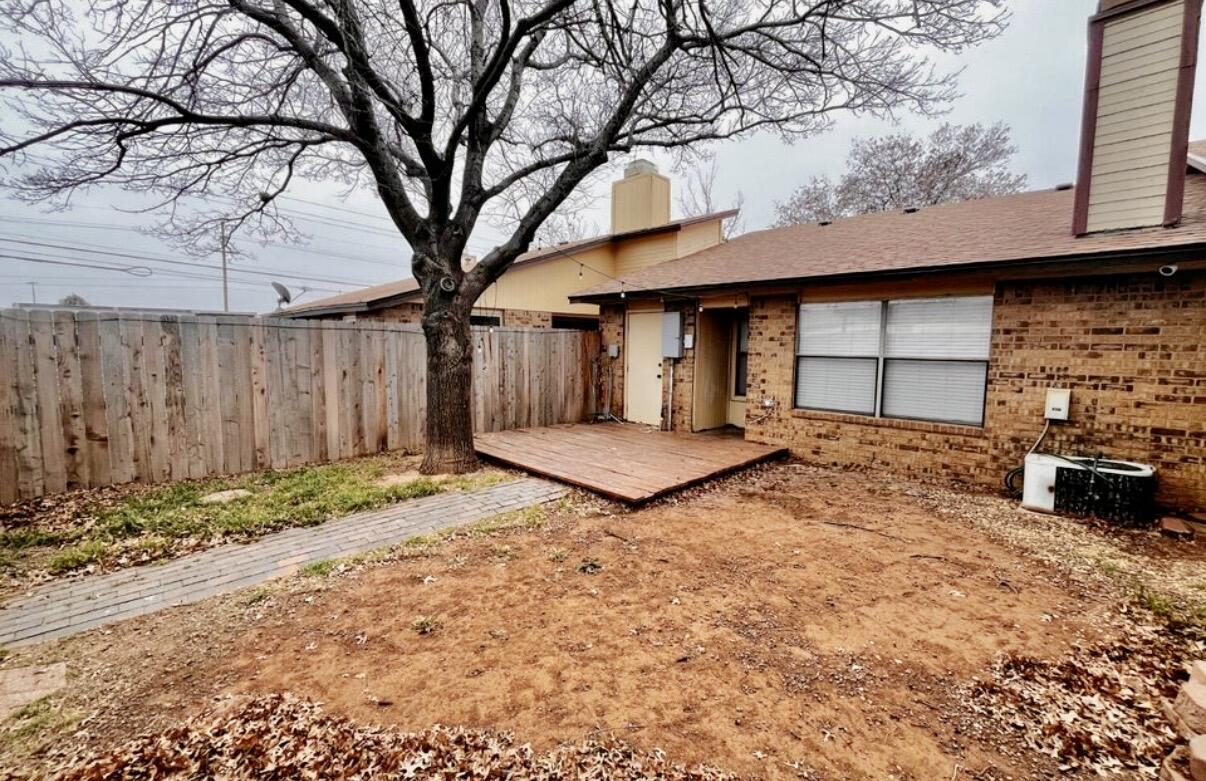 5806 7th Street Lubbock, TX 79416 - Photo 25 of 26 a view of a house with a yard