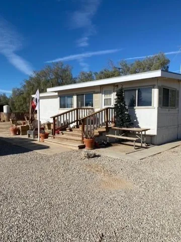a view of a house with a patio