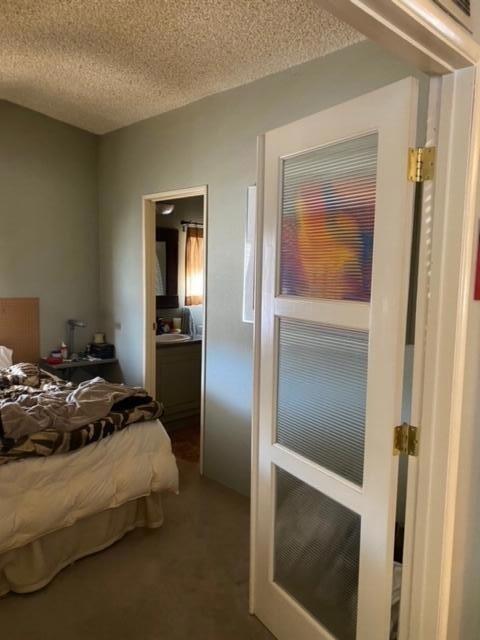 24101 Rice Road Desert Center, CA 92239 - Photo 12 of 29 a bedroom with a bed and a mirror