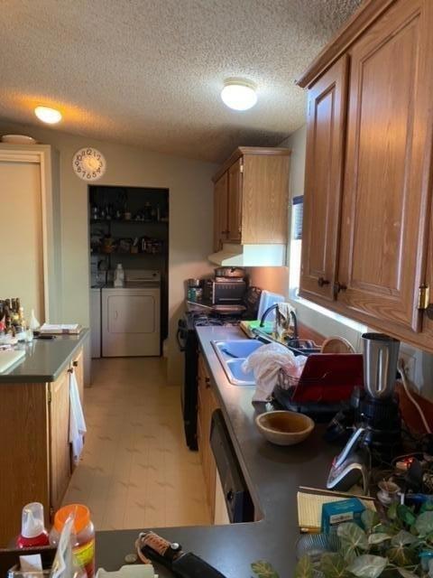 24101 Rice Road Desert Center, CA 92239 - Photo 16 of 29 a kitchen with a refrigerator and a stove top oven