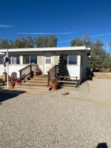 a view of a house with a patio