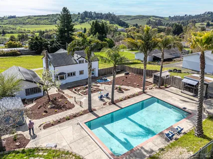 a house view with a garden space