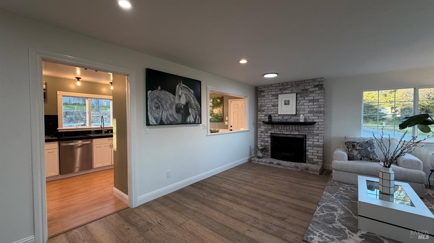 2693 Bloomfield Road Sebastopol, CA 95472 - Photo 22 of 61 a living room with furniture and a fireplace