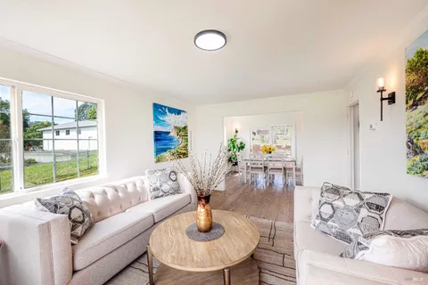 a view of swimming pool with a table and chairs