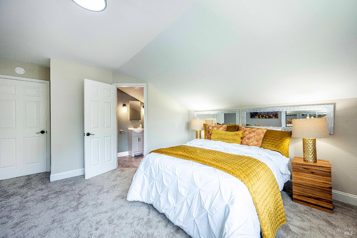 2693 Bloomfield Road Sebastopol, CA 95472 - Photo 39 of 61 a bedroom with a bed and a lamp