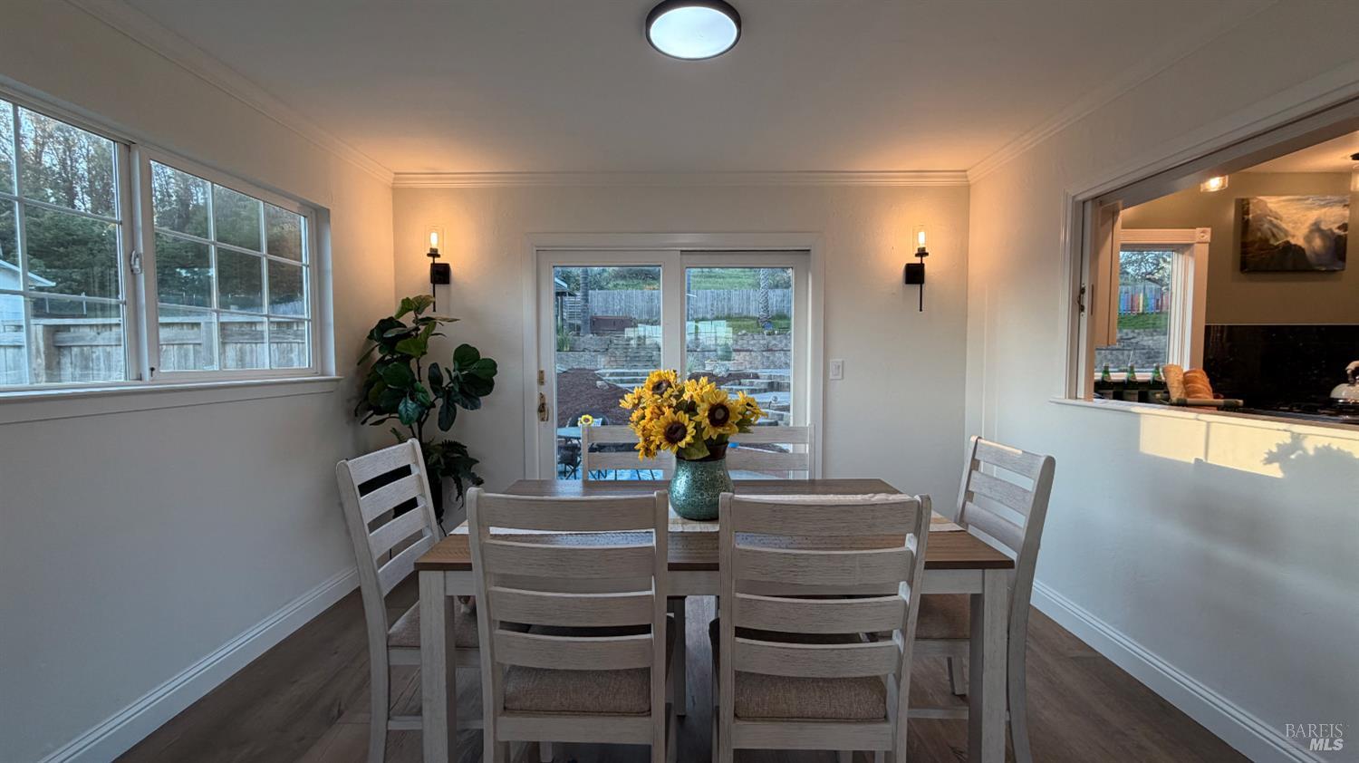 2693 Bloomfield Road Sebastopol, CA 95472 - Photo 42 of 61 a dining room with furniture and potted plants