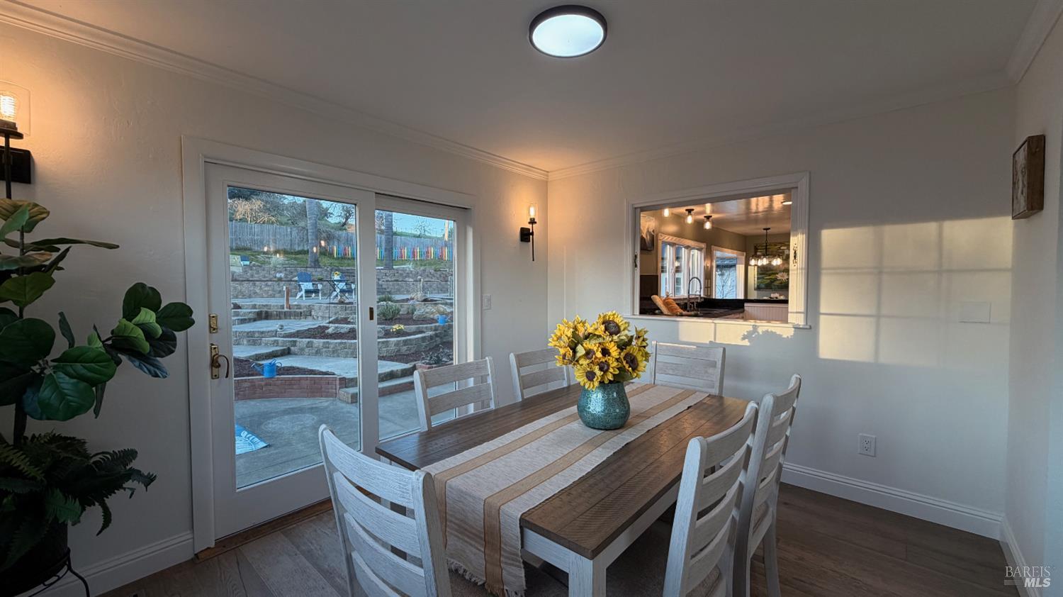 2693 Bloomfield Road Sebastopol, CA 95472 - Photo 44 of 61 a view of a dining room with furniture and a potted plant