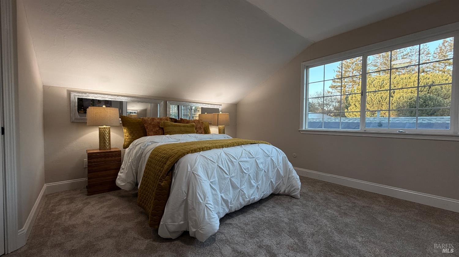 2693 Bloomfield Road Sebastopol, CA 95472 - Photo 50 of 61 a bed sitting in a bedroom next to a window