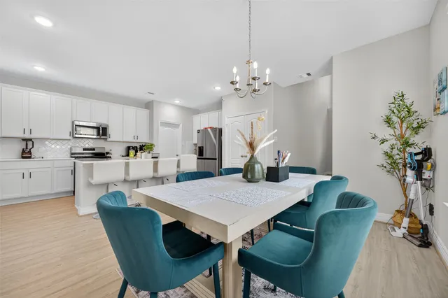 a view of kitchen with dining area