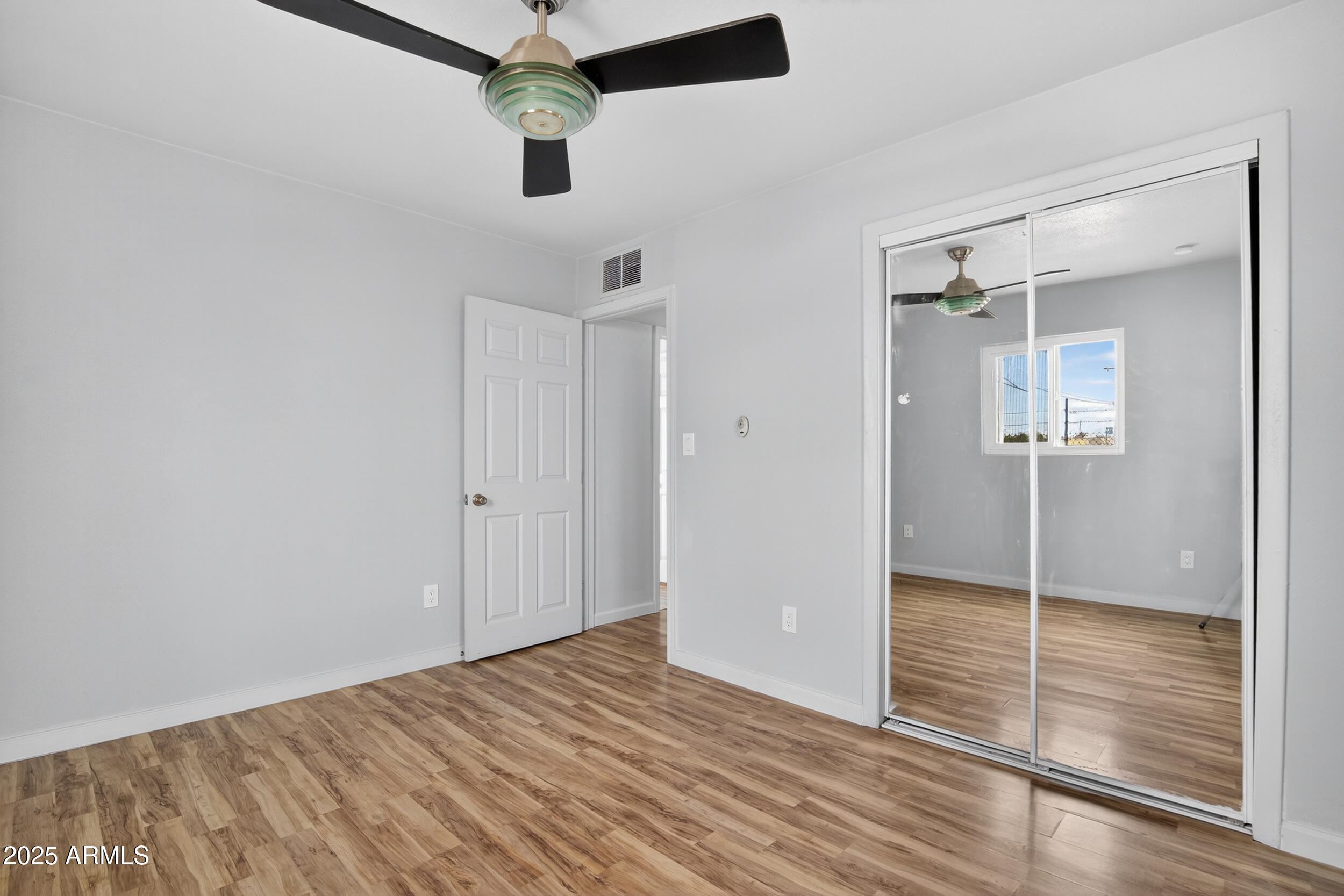 1410 South 24th Avenue, Unit A Phoenix, AZ 85009 - Photo 24 of 36 wooden floor in an empty room