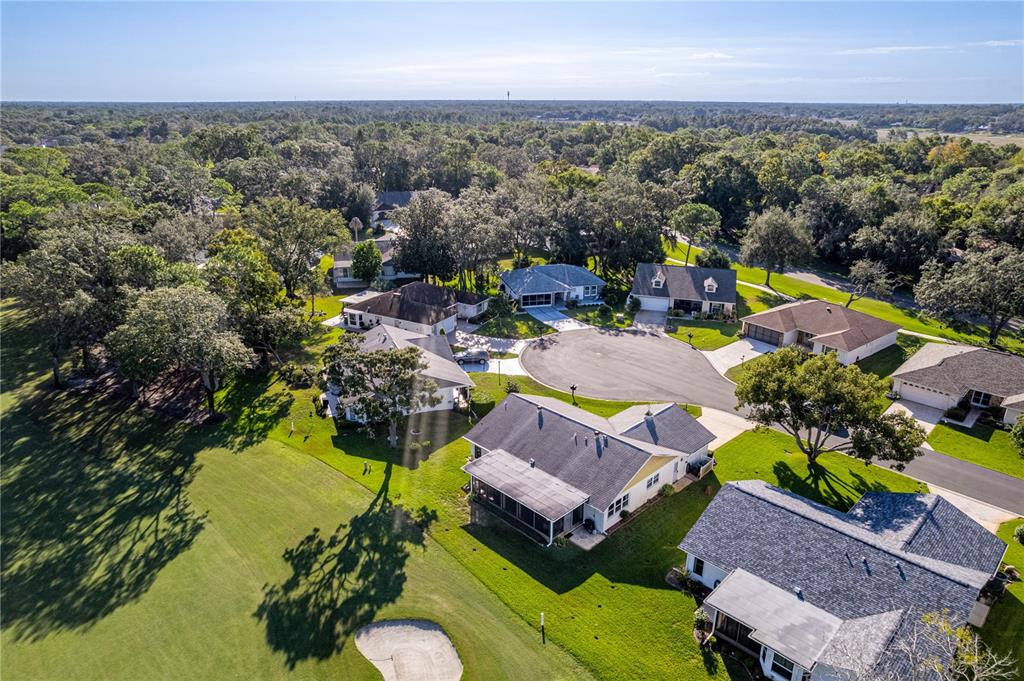 6163 Spyglass Court Spring Hill, FL 34606 - Photo 24 of 73 an aerial view of a house with a garden