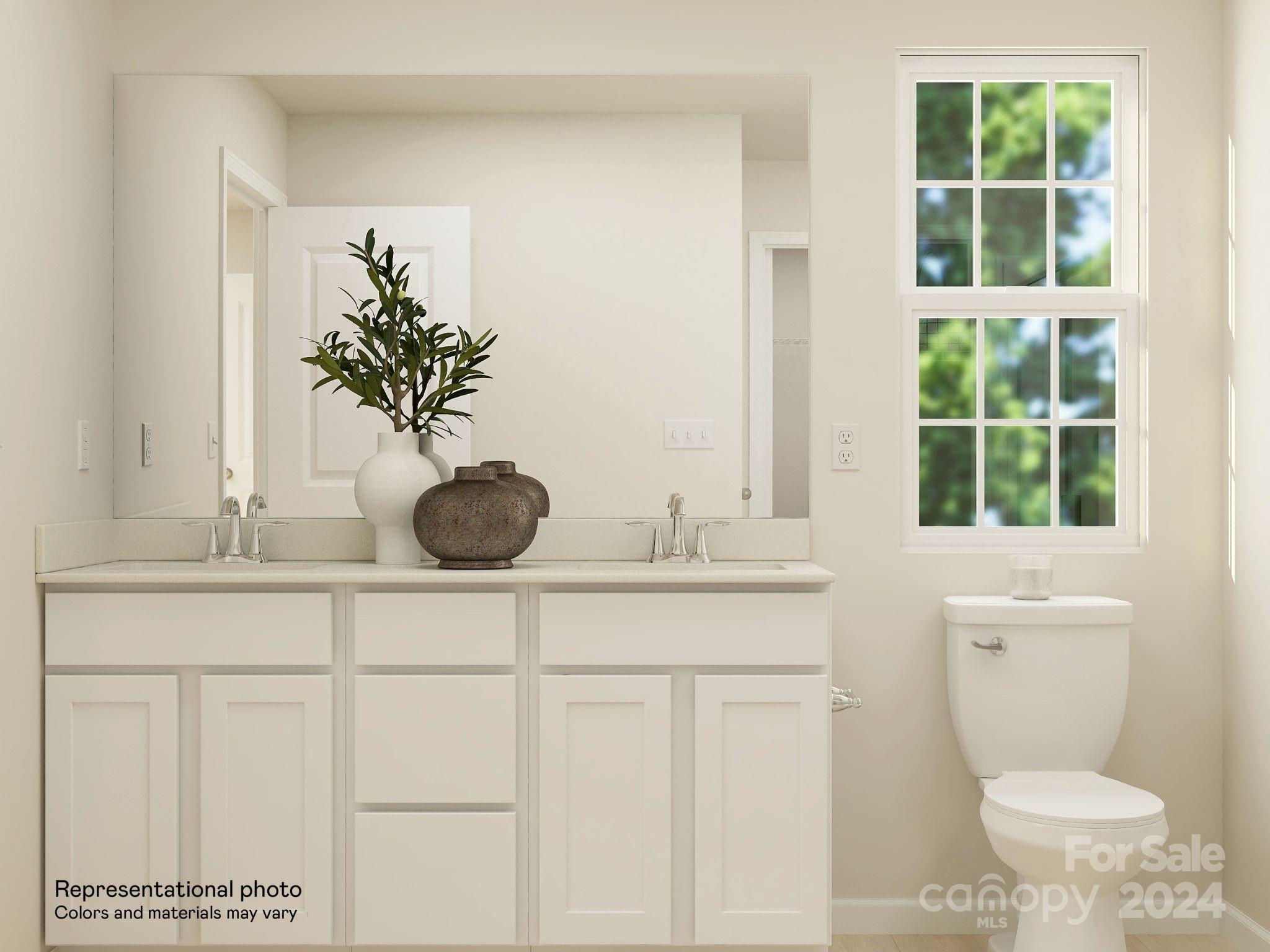 653 Mile Crk Road, Unit 93 Edgemoor, SC 29712 - Photo 12 of 14 a bathroom with a toilet a sink and window