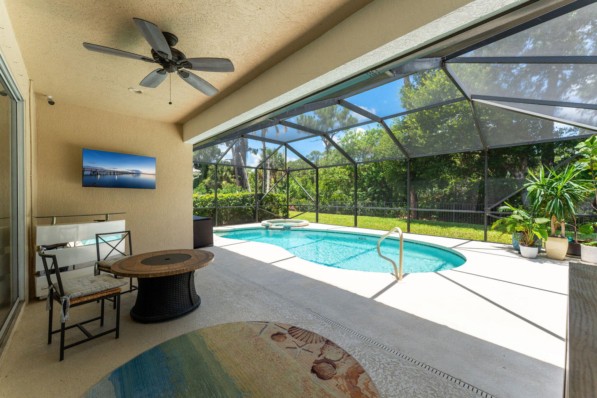 7657 Fieldstone Ranch Square Vero Beach, FL 32967 - Photo 36 of 52 a view of a swimming pool with a patio