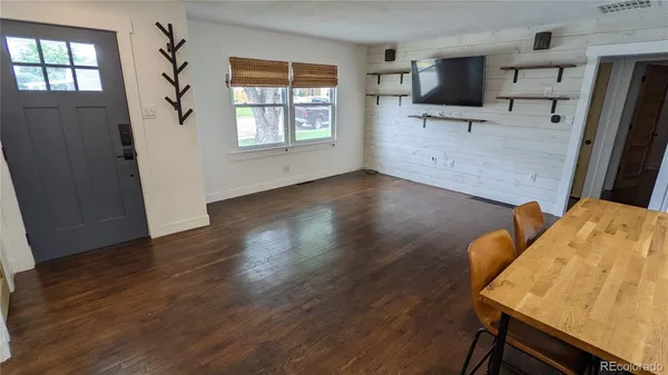 a view of kitchen and wooden floor