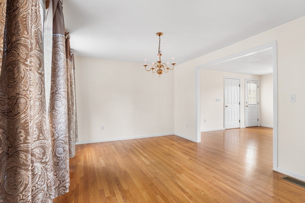 70 Loring Avenue Boxborough, MA 01719 - Photo 11 of 33 a view of a room with wooden floor