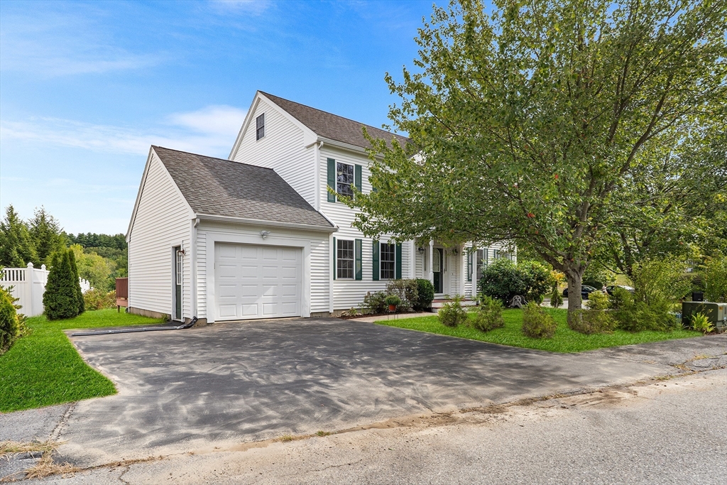 70 Loring Avenue Boxborough, MA 01719 - Photo 2 of 33 a front view of house with yard and trees